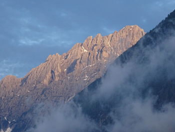 Scenic view of rocky mountains against sky