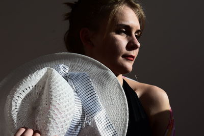 Close-up portrait of a serious young woman