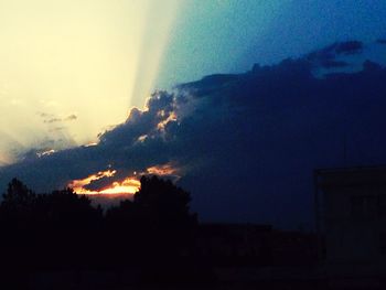 Scenic view of landscape against cloudy sky