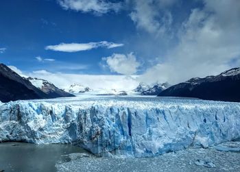 Scenic view of frozen sea against sky