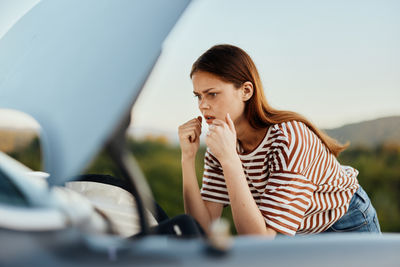 Young woman using mobile phone