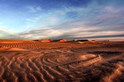 Scenic view of desert against sky