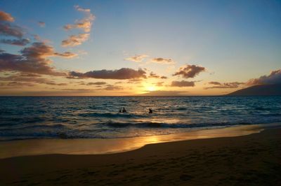 Scenic view of sea against sky during sunset