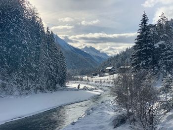 Scenic view of snowcapped mountains against sky