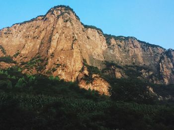 Scenic view of mountains against clear sky