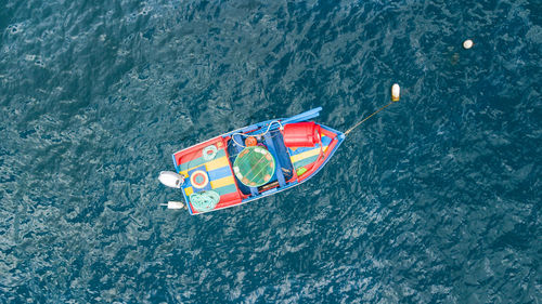 High angle view of boat floating on sea