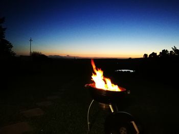 Bonfire against sky at night