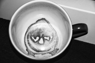 High angle view of coffee cup on table