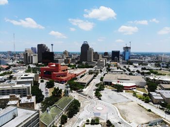 High angle view of buildings in city against sky