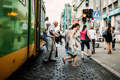 People walking on street in train