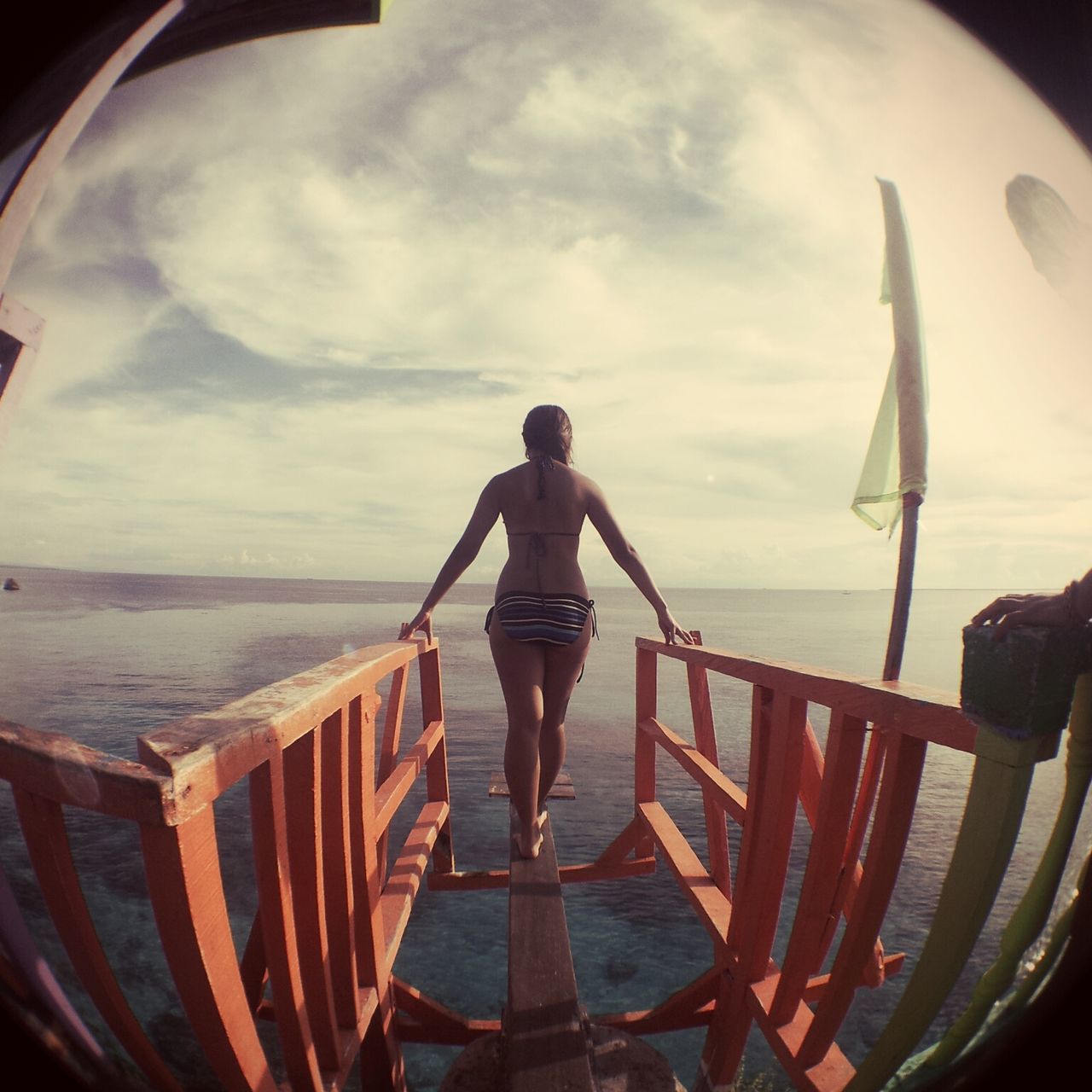 sea, horizon over water, water, sky, rear view, lifestyles, leisure activity, cloud - sky, beach, full length, standing, person, scenics, tranquility, tranquil scene, cloud, beauty in nature, nature