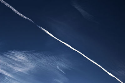 Low angle view of vapor trail in sky