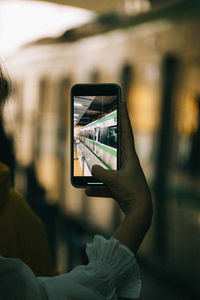 Close-up of woman using mobile phone