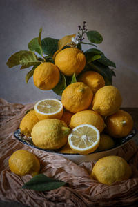 Close-up of lemon fruits on table