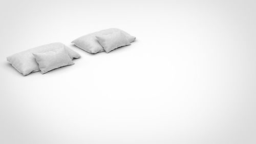 Close-up of cake against white background