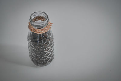 Close-up of glass jar on table