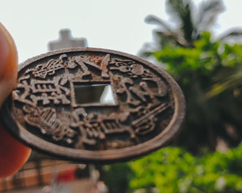 Close-up of old rusty wheel