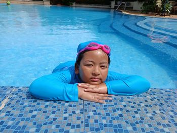 High angle view of woman swimming in pool