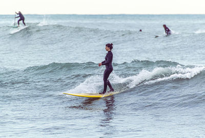 Man surfing in sea