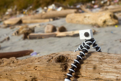 Close-up of rope on sand at beach