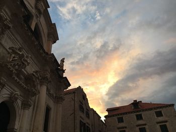 Low angle view of buildings against sky