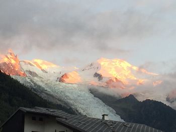 Scenic view of mountains against sky during winter