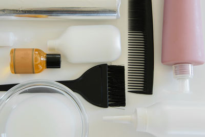 High angle view of hair dye on white background