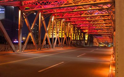 Illuminated road at night