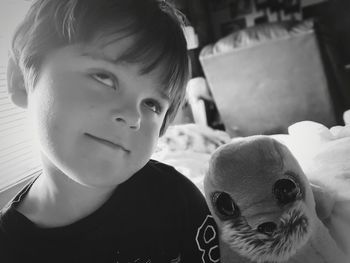 Close-up portrait of boy at home