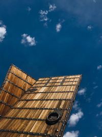 Low angle view of building against blue sky