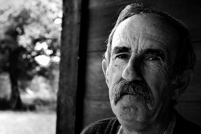 Portrait of man wearing sunglasses outdoors