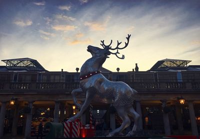 Low angle view of statue in city