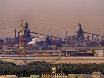 A blast furnace in a steel mill in the evening