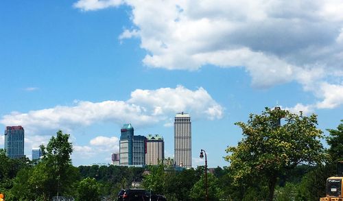 Low angle view of building against cloudy sky