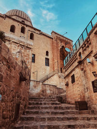 Low angle view of old building against sky