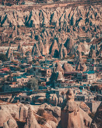 Aerial view of houses amidst rock formations