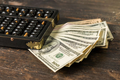 High angle view of coins on table