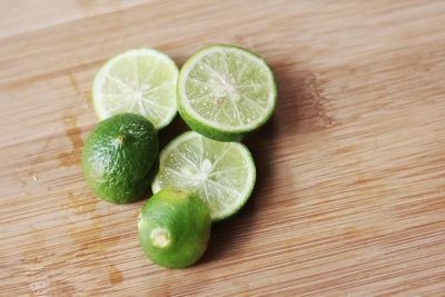 High angle view of fruits on wood