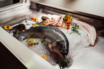 High angle view of fish in plate on table