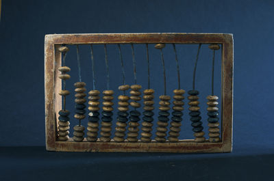 Wooden abacus on a dark background