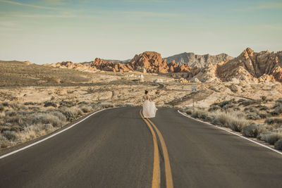 Woman on mountain road