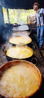 Man preparing food at market