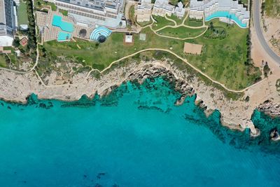 Aerial view of sea by city