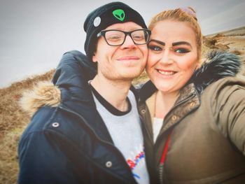 Portrait of smiling young couple