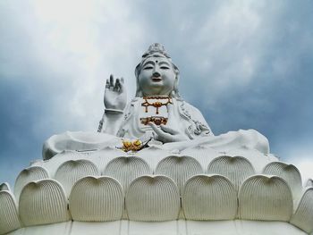 Low angle view of statue against sky