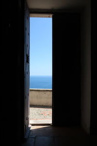 Scenic view of sea seen through window