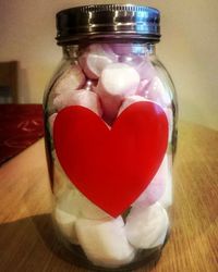 Close-up of heart shape jar