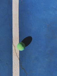 High angle view of blue ball on wall