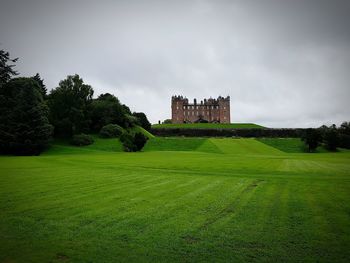 Castle on grassy field