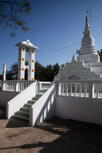 Built structure by building against clear sky